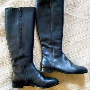 Knee High black leather boots from Saks. Worn 1x